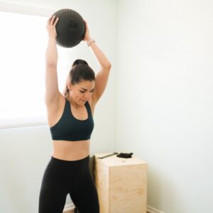 6 Slam Ball Exercises to Do for Explosive Power, Full-Body Strength, and Serious Stress Relief