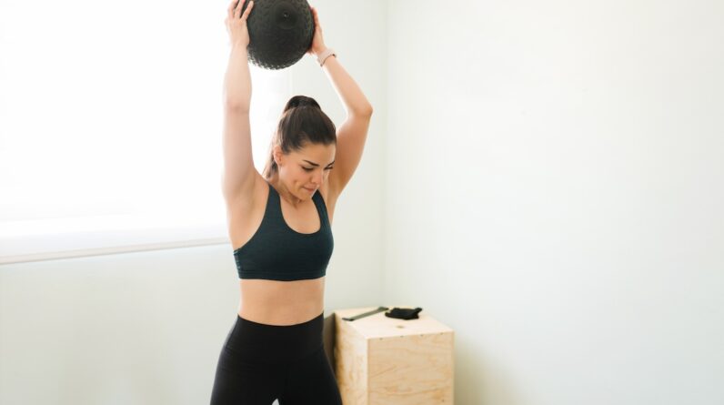 6 Slam Ball Exercises to Do for Explosive Power, Full-Body Strength, and Serious Stress Relief