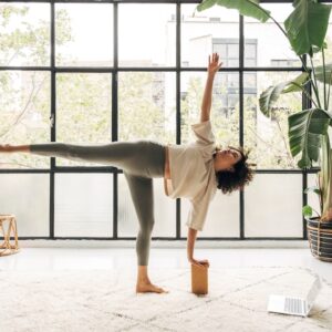 Been Feeling Weighed Down? Here’s How To Reach for the Stars With Yoga’s Half Moon Pose