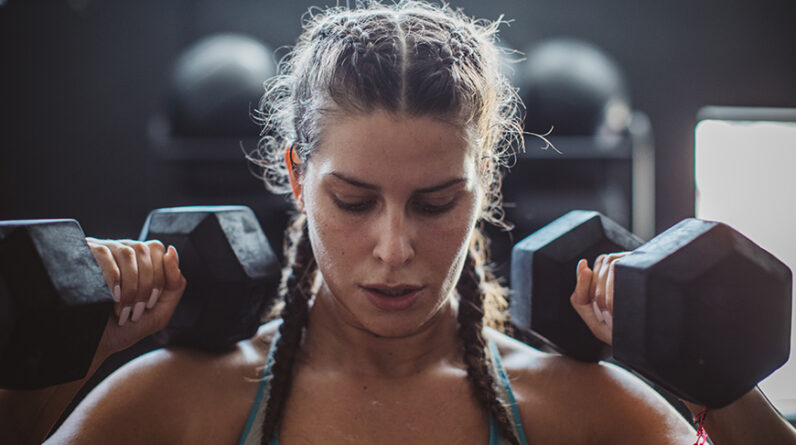 7 Anything-But-Boring Workouts You Can Do With a Pair of Dumbbells