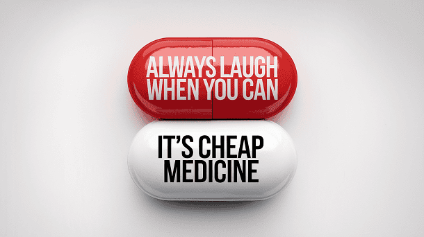 Two medical pills that say that laughter is a cheap medicine.