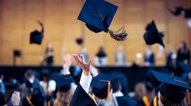 A gradation hat thrown into the air.