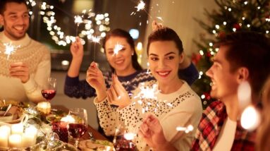 Happy friends at the dinner for New Year