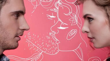 An image of a man and a woman looking into each other's eyes with a drawing behind them on the wall of them kissing.