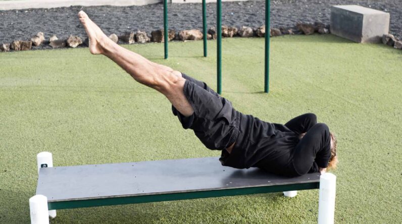 Strengthen your core with dragon flag exercise