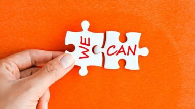 A and holding puzzle pieces that say: WE CAN.
