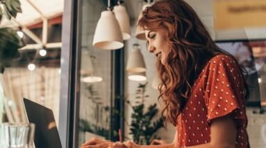 Woman working on her laptop.