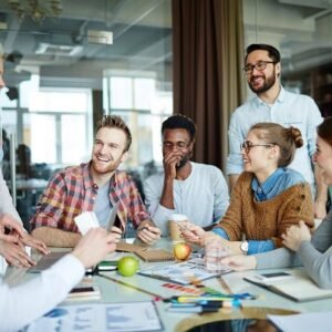 A team in a good mood at a meeting at work.