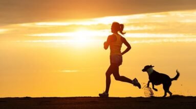 Woman on run in the sun with her dog.