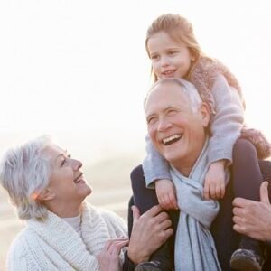 Grandparents having fun with their grand-daughter.