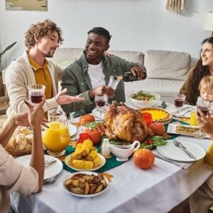Friends having a Thanksgiving meal together.