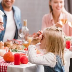 A family at Thanksgiving dinner.