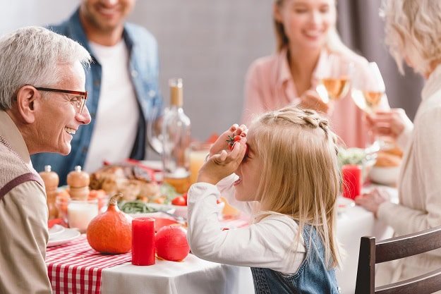 A family at Thanksgiving dinner.