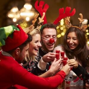 Friends in Christmas costumes having fun.