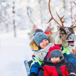 A mom and her kids at a reindeer safari in winter.