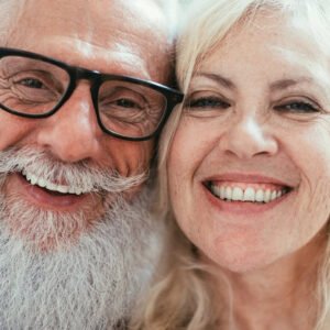 Two happy and smiling older people.